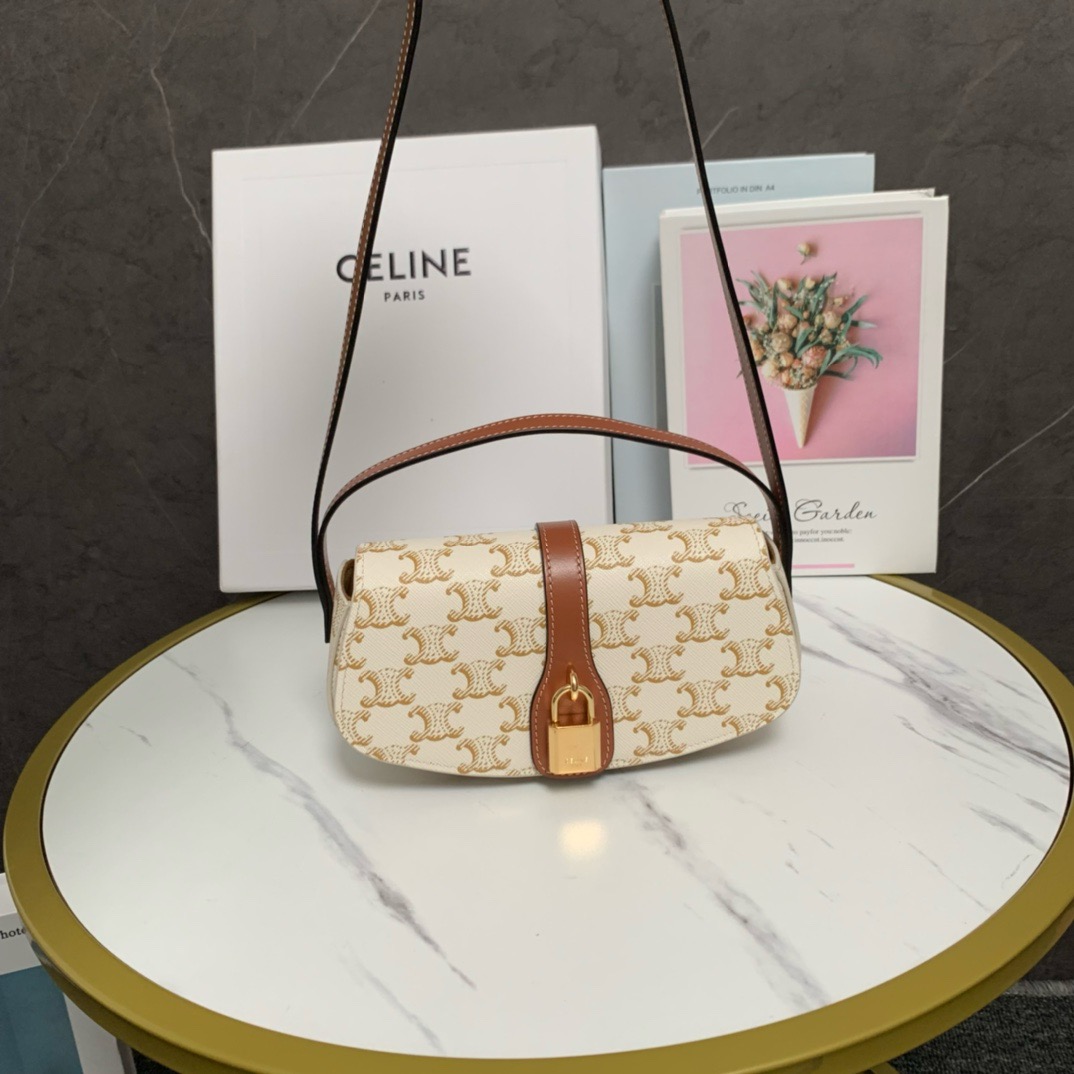 CELINE CLUTCH ON STRAP TABOU IN TRIOMPHE CANVAS AND CALFSKIN 101592 WHITE&TAN