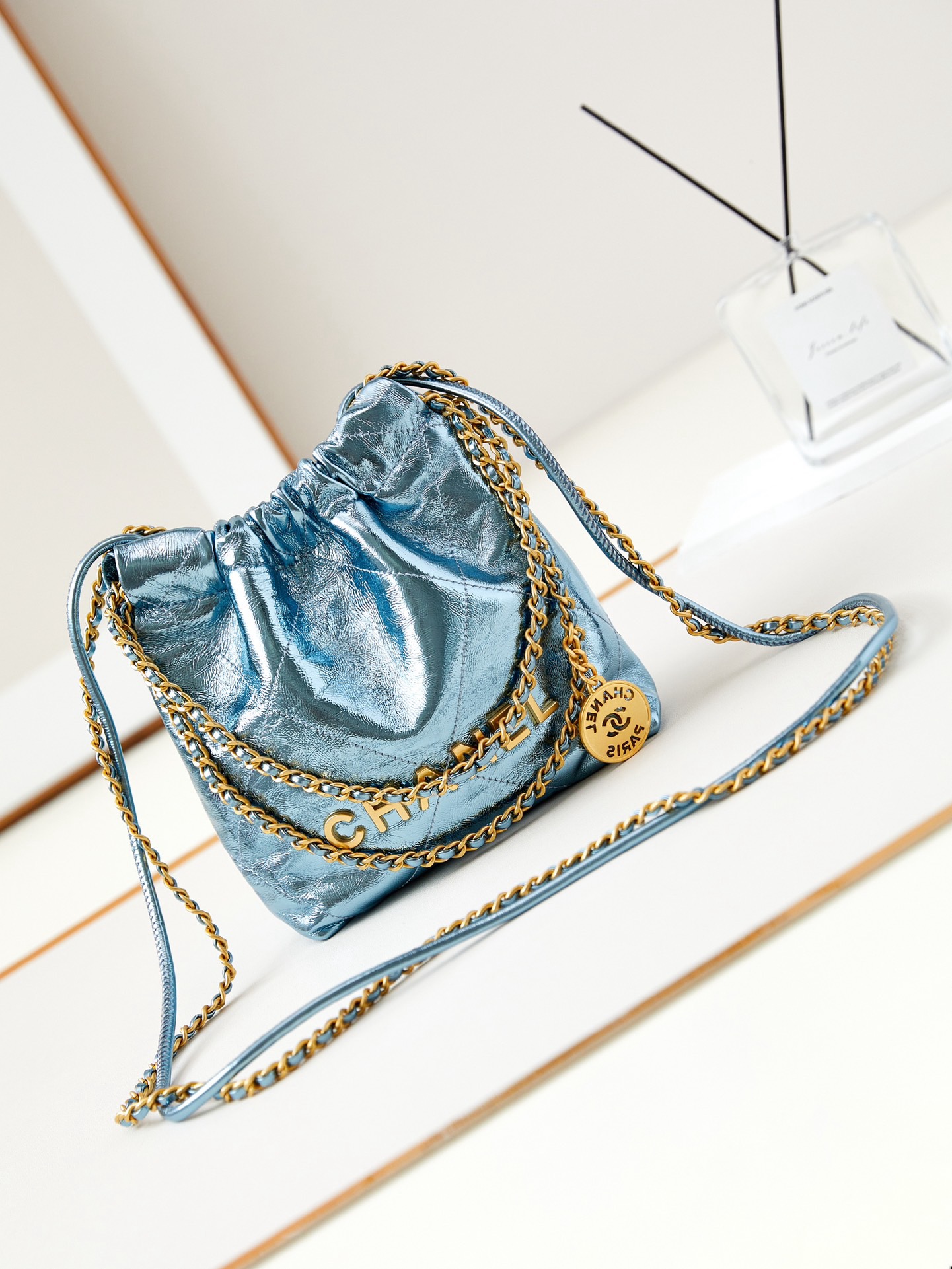 CHANEL 22 MINI HANDBAG AS3980 Pearlescent blue